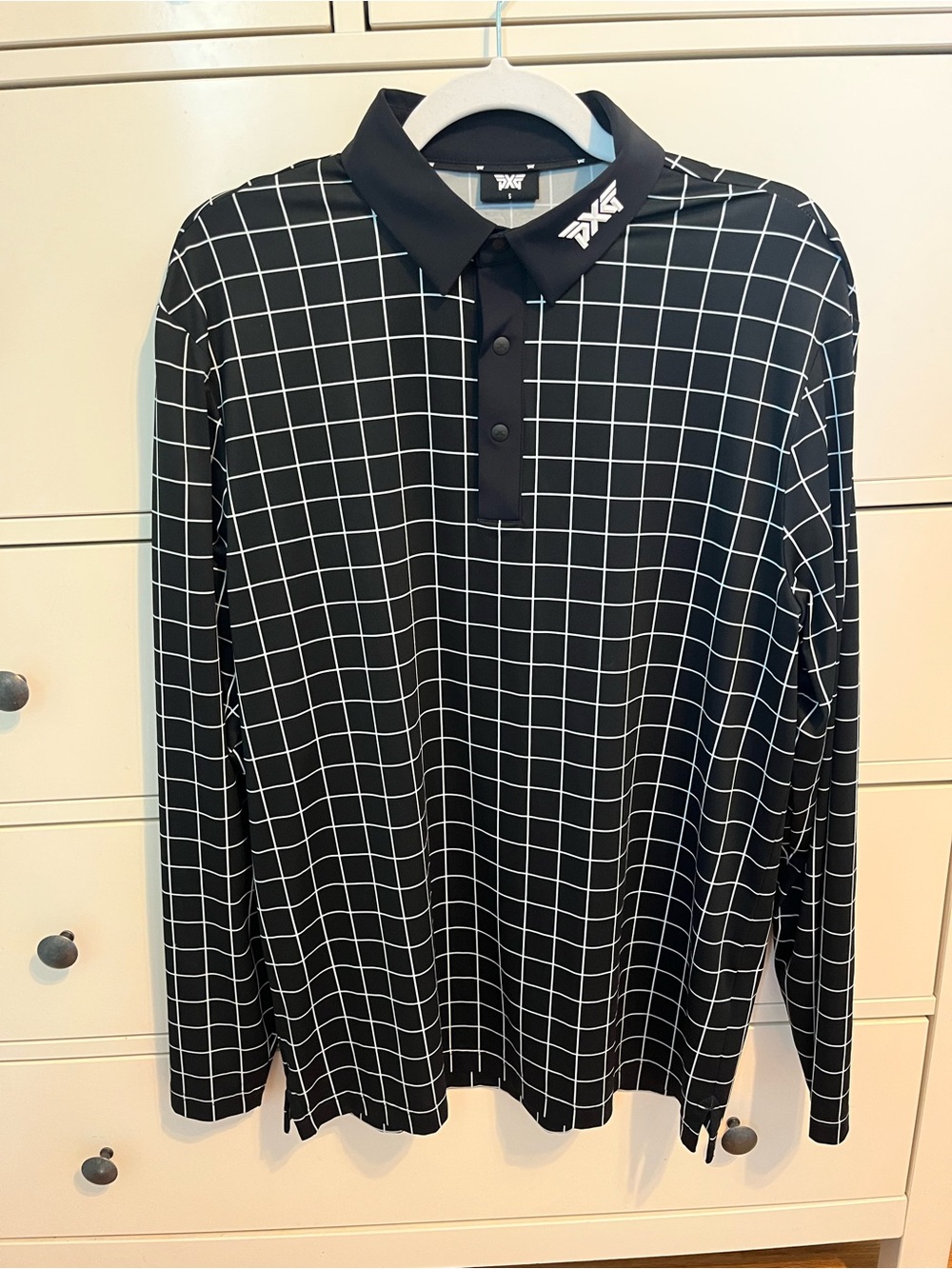PXG Black Polo with White Grid Pattern